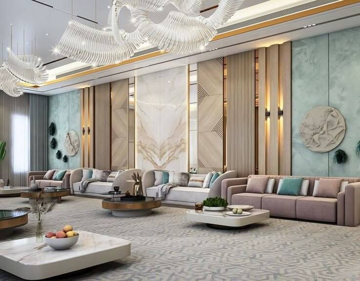 Luxury Living Room with Marble Panels and Custom Chandelier - interior design by Livspot Projects